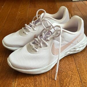 Size 7.5 Nike Revolution Race Running Shoe women’s. Violet champane white